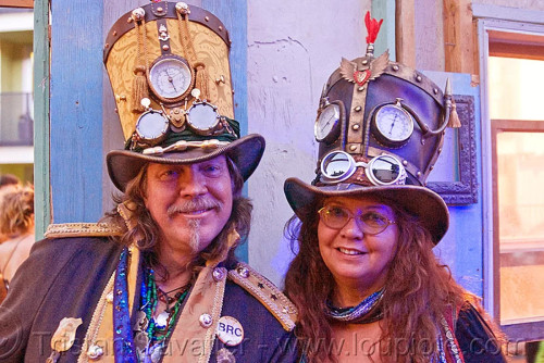 couple with steampunk hats burni