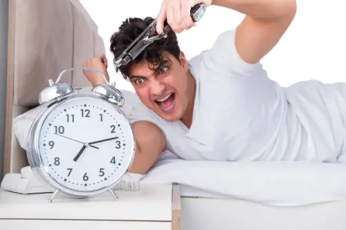 depositphotos 163399818 stock photo man in bed suffering from