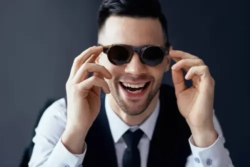 depositphotos 271911412 stock photo happy laughing man retro sunglasses