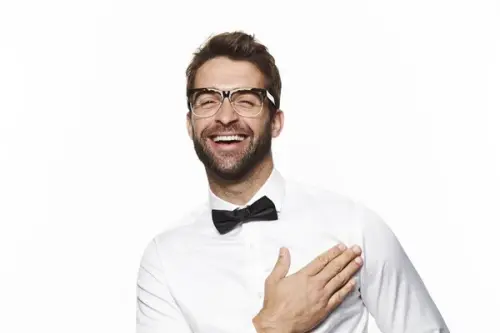 depositphotos 141881550 stock photo laughing guy with bow tie