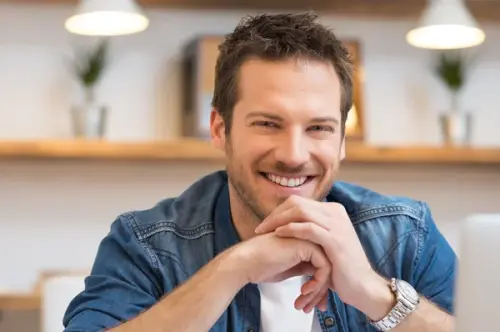 depositphotos 64222487 stock photo smiling young man