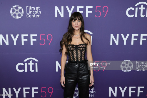 NEW YORK, NEW YORK - SEPTEMBER 29: Dakota Johnson attends the premiere of "The Lost Daughter" during