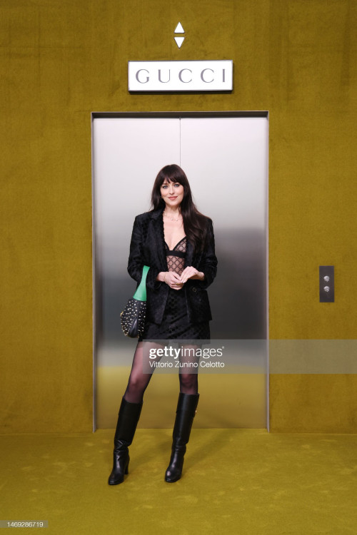 MILAN, ITALY - FEBRUARY 24: Dakota Johnson arrives at the Gucci show during Milan Fashion Week Fall/