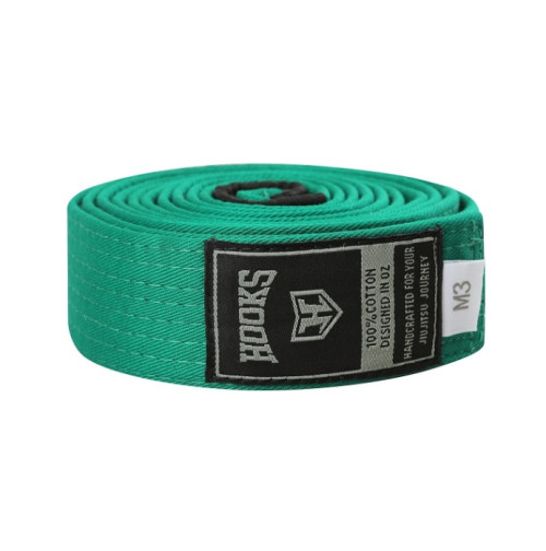 Check out our wide range of BJJ and Jiu Jitsu belts from Hooks Jiujitsu. We have a huge collection of premium BJJ belts available in a range of colours. Our Gi belts have the perfect balance between lightness and durability. Brazilian BJJ is a martial art that uses grappling and ground fighting techniques. The ranking system in BJJ is based on colored belts that signify a practitioner's level of expertise and experience. The white belt is the starting belt for all beginners. A blue belt represents a more experienced practitioner who has developed a solid foundation of fundamental techniques. A purple belt indicates that the practitioner has gained a deeper understanding of BJJ principles and has developed a more refined skill set. A brown belt represents an advanced level of proficiency and technical knowledge in BJJ. The black belt is the highest in BJJ, and it indicates that the practitioner has mastered the art and is considered an expert in BJJ. Comes with rank to add degrees, approved by IBJJF for competition. Shop today! Visit https://hooksbrand.com/collections/belts